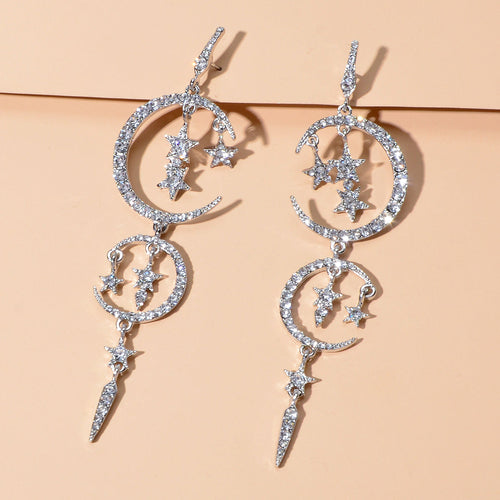 Celestial Cascade | Rhinestone Star & Moon Chandelier Earrings