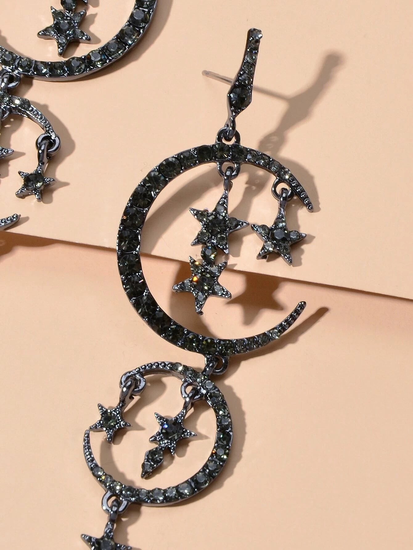 Celestial Cascade | Rhinestone Star & Moon Chandelier Earrings